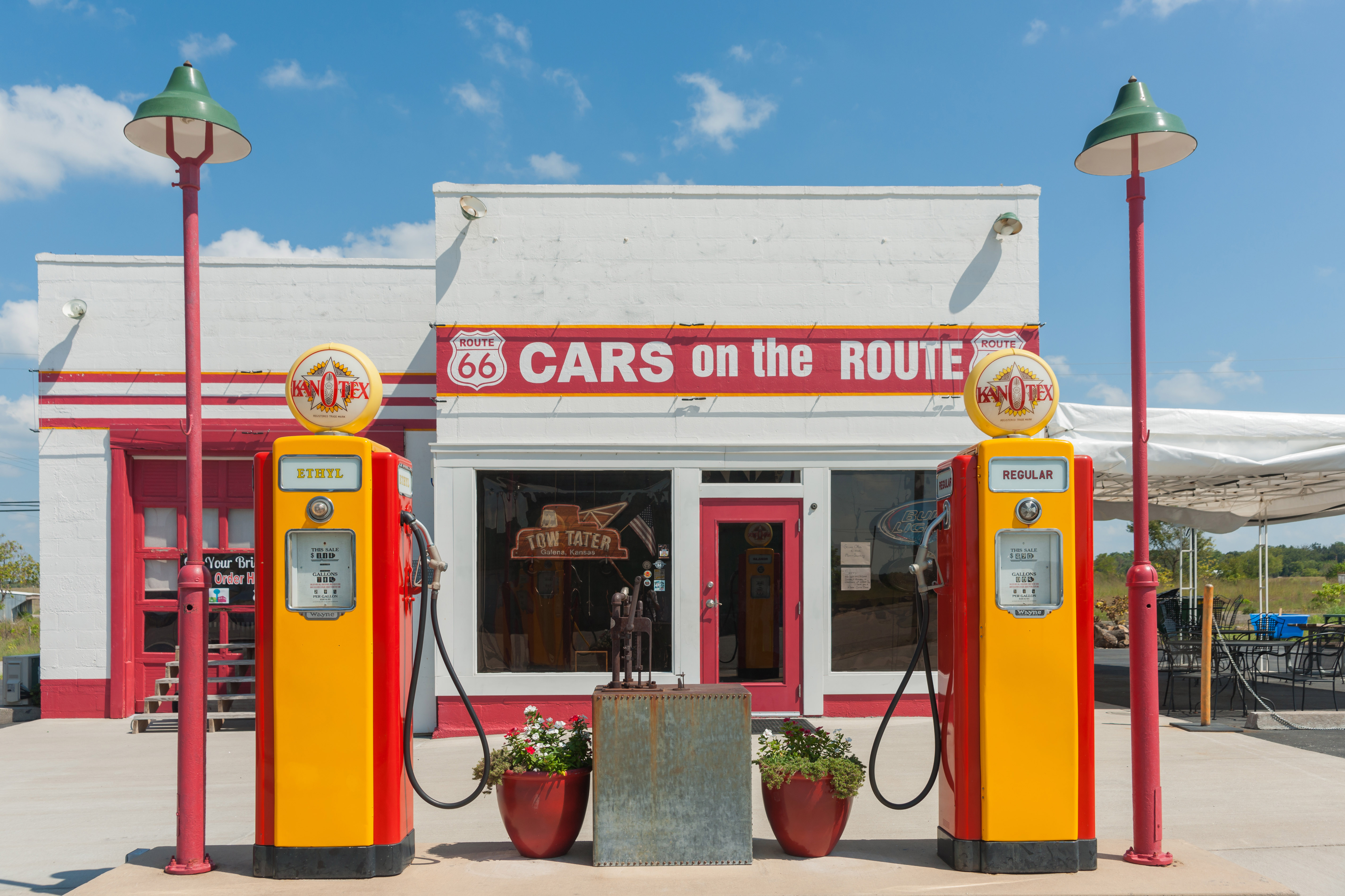 Cars on the Route historic service station on Route 66 in Galena, Kansas