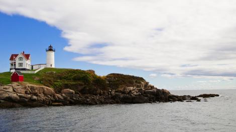 Cape Neddick Lighthouse in Maine on the rocky New England coast