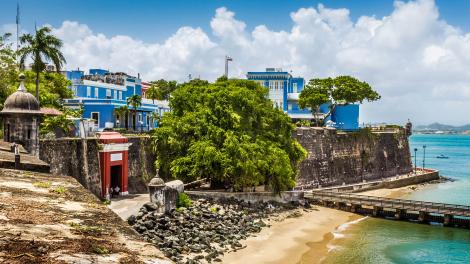 Brightly colored buildings lining San Juan Harbor