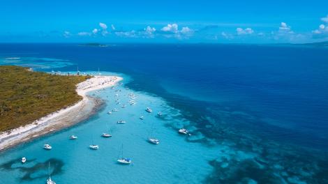 Sailboats along the coastline of Cayo Icacos, part of la Cordillera Nature Reserve