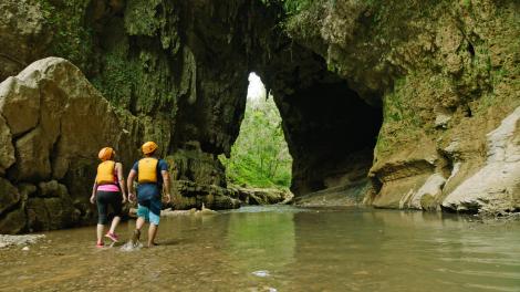 Exploring caves at Tanamá River Adventures in Utuado