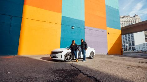 Posing in front of mural art in Detroit, Michigan