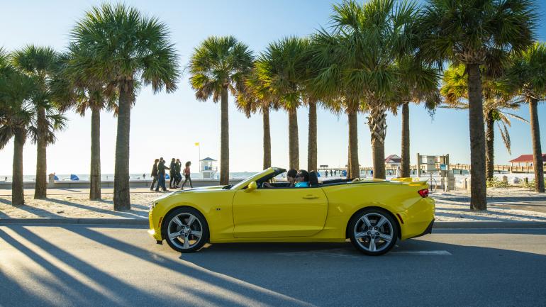 Driving a convertible with the top down in Clearwater Beach, Florida