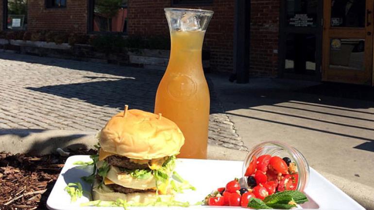 Popular specialty stack burger and side at Urban Stack 
