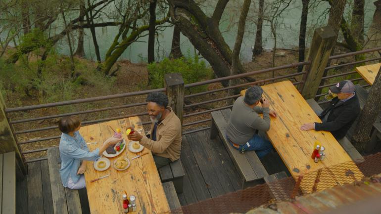 Outside the Gristmill Restaurant, overlooking the Guadalupe River