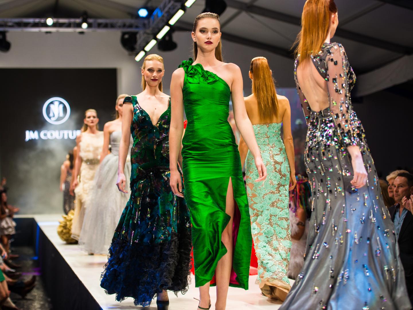 Walking the runway at Fashion Week El Paseo