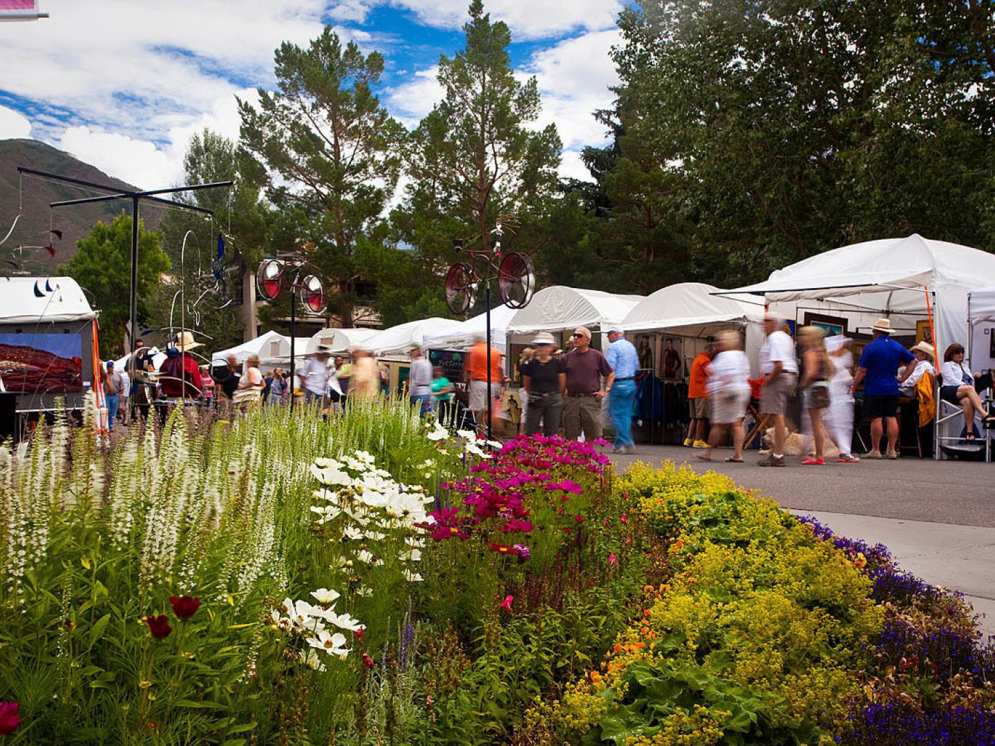 Browsing art booths at the Aspen Arts Festival
