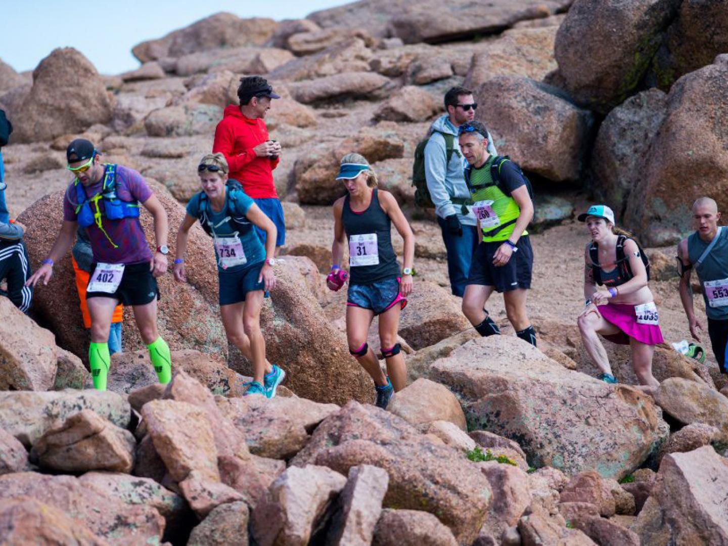 Athletes race up the mountain in the Pikes Peak Ascent and Marathon