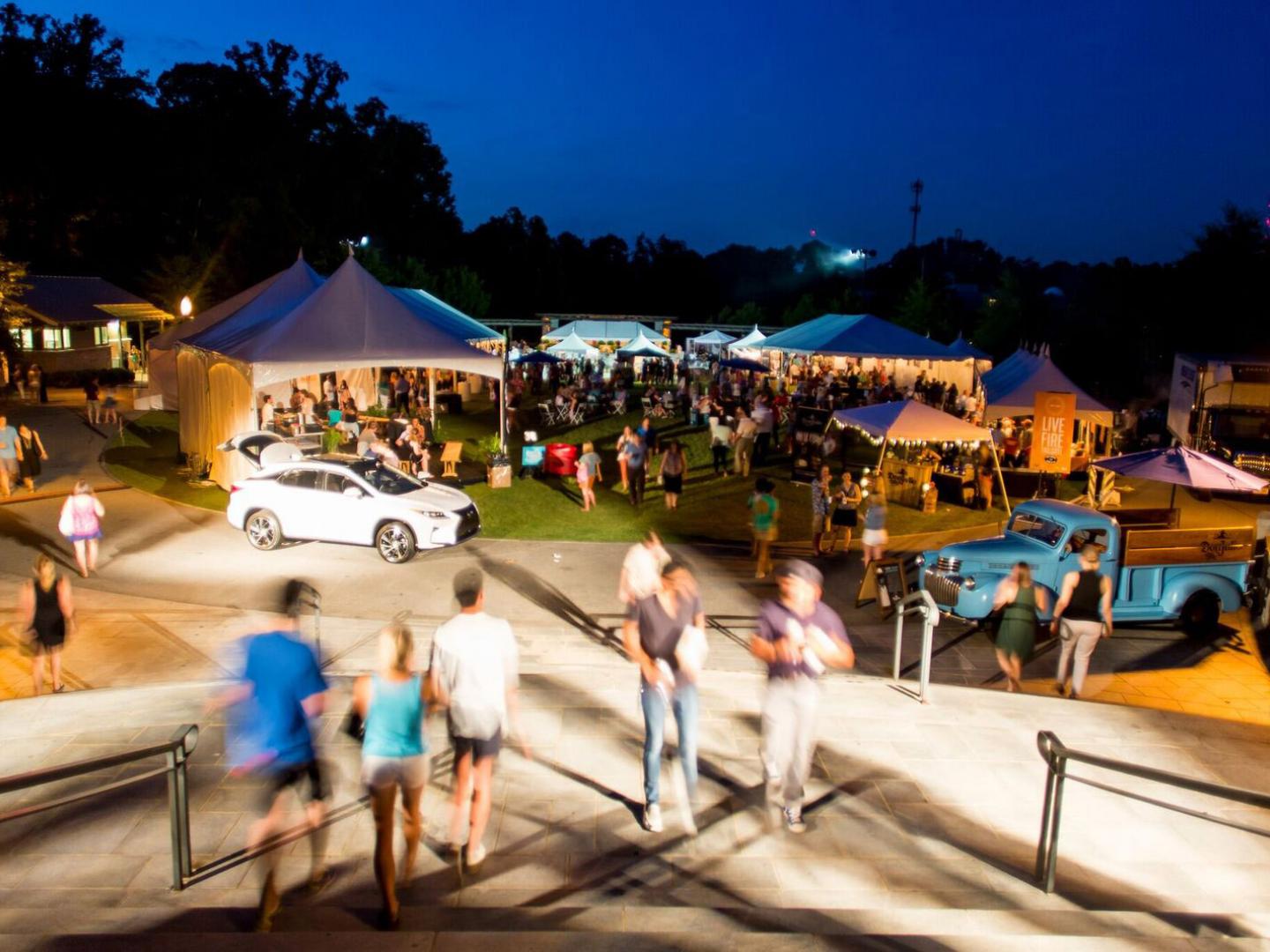 An outdoor culinary event during the Atlanta Food & Wine Festival