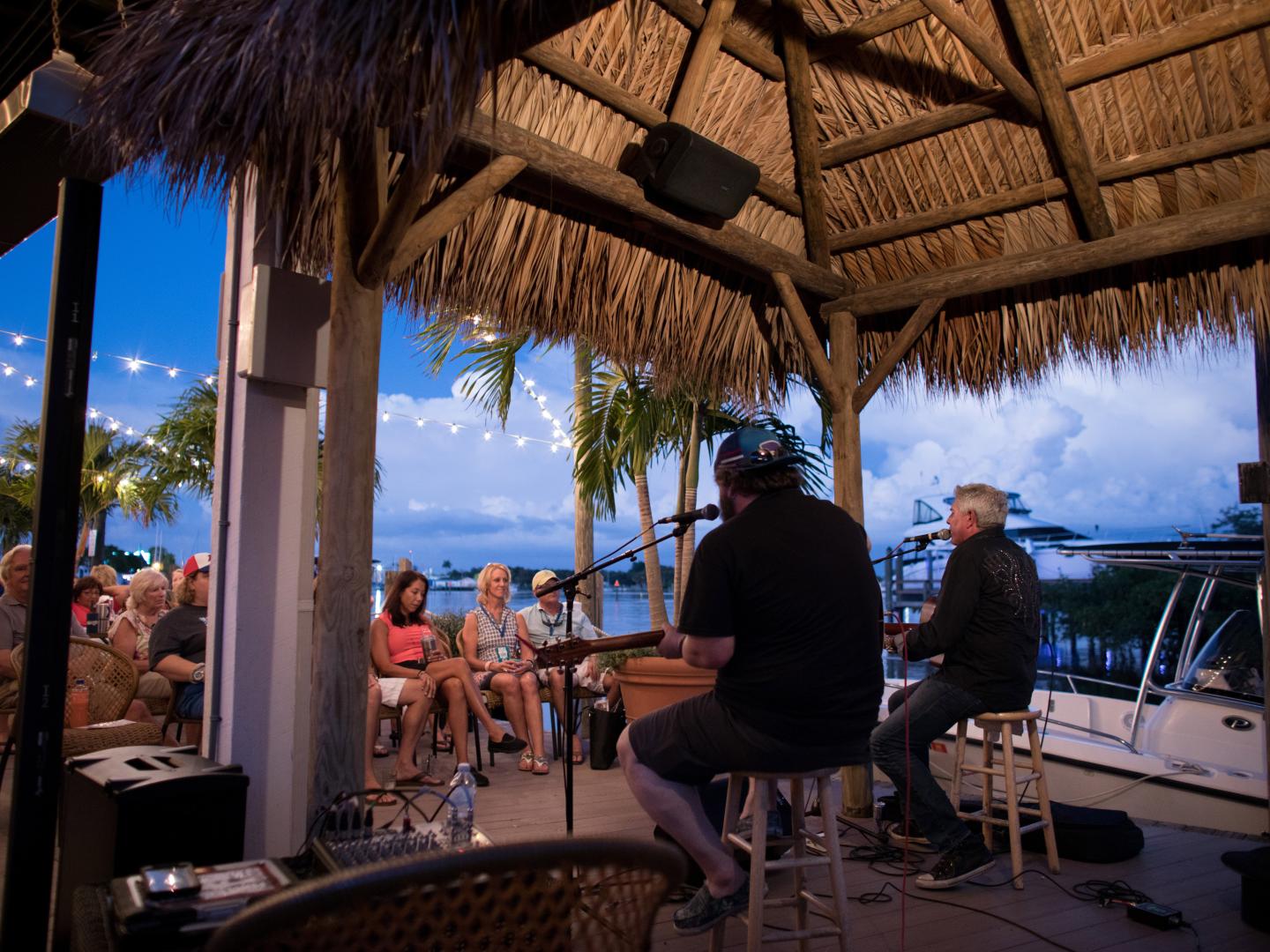 A waterfront performance during the Island Hopper Songwriter Fest