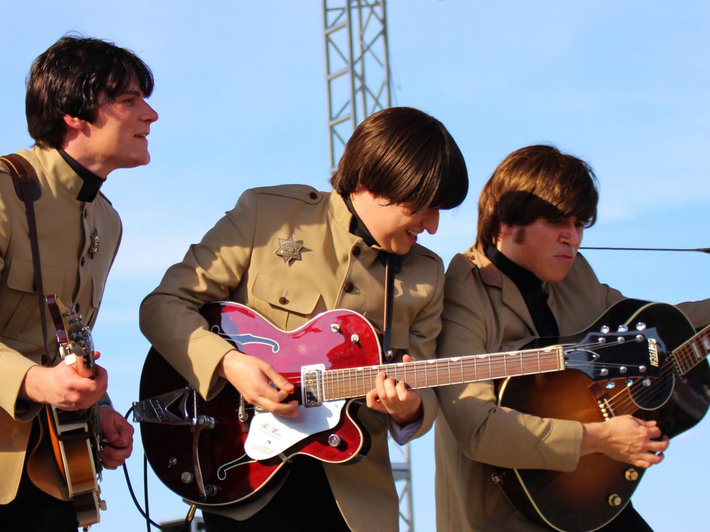 A Beatles tribute band playing live music at Abbey Road on the River near Louisville, Kentucky