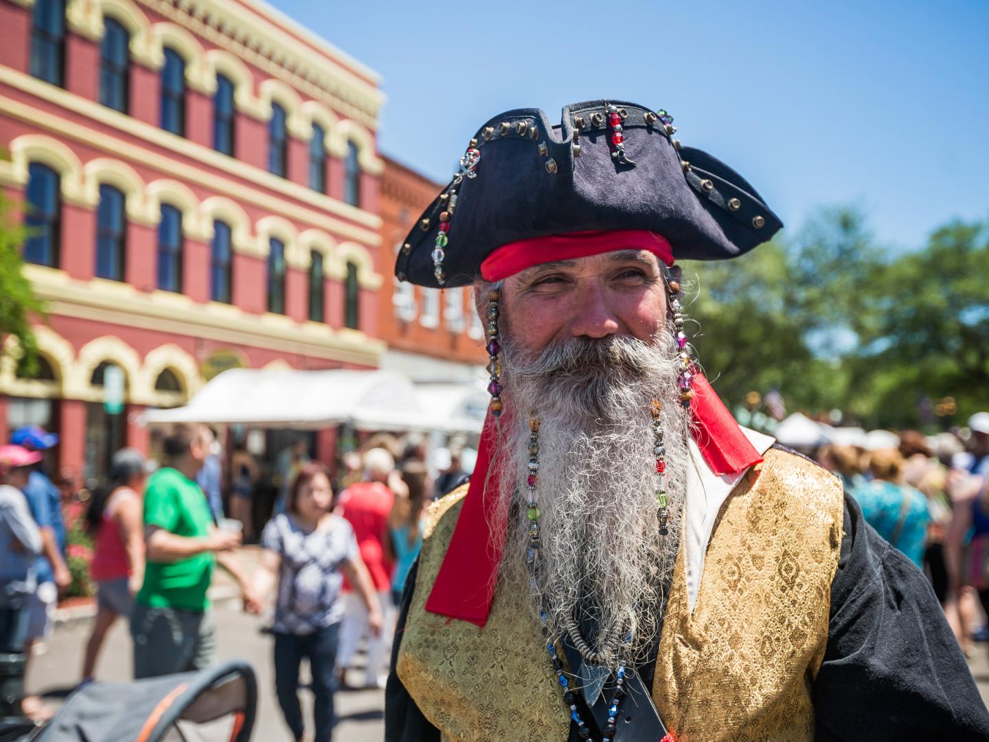 Strolling the streets with pirates during the Isle of Eight Flags Shrimp Festival in Amelia Island, Florida