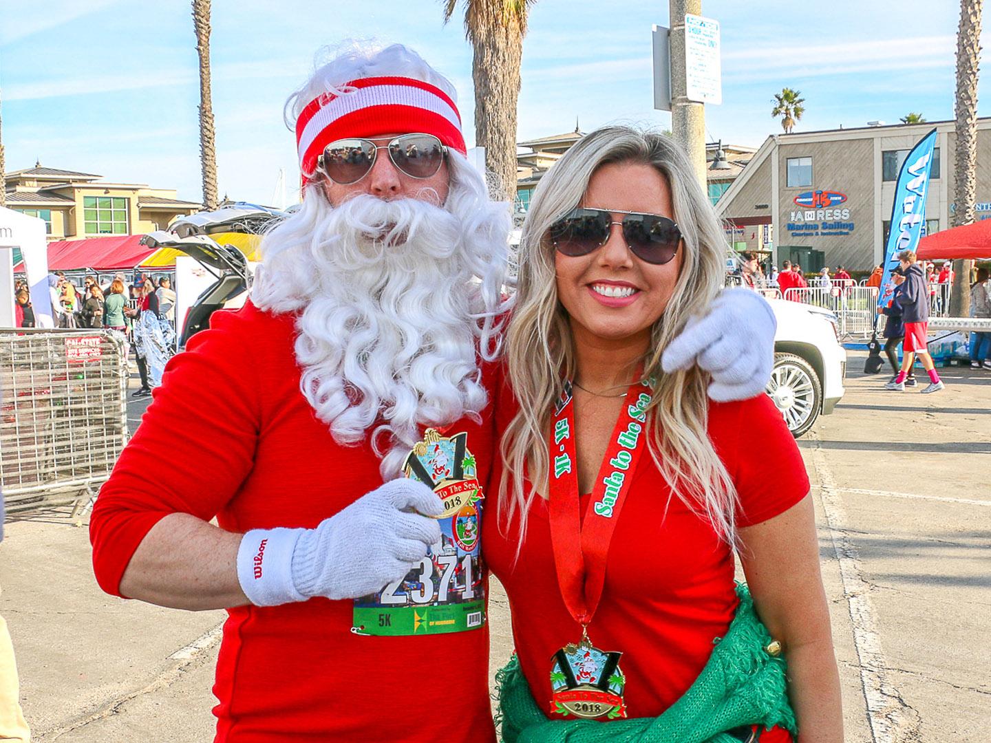 Costumed competitors at the Santa to the Sea 5K and Half Marathon in Oxnard, California