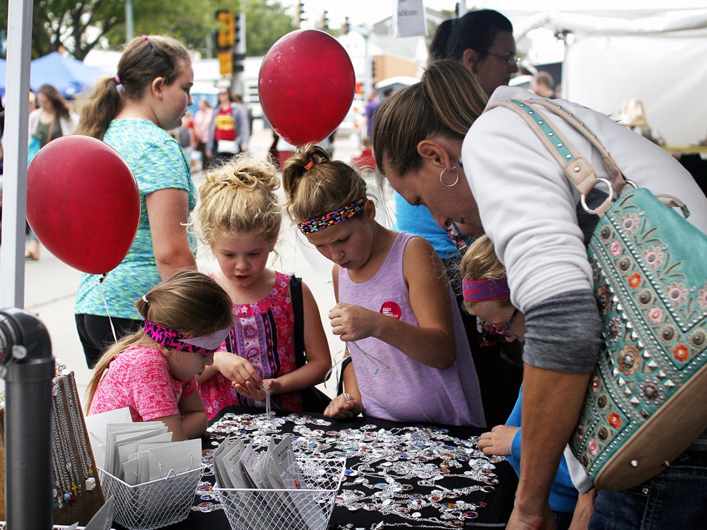 Hands-on crafts during the Sidewalk Arts Festival at Washington Pavilion in Sioux Falls, South Dakota