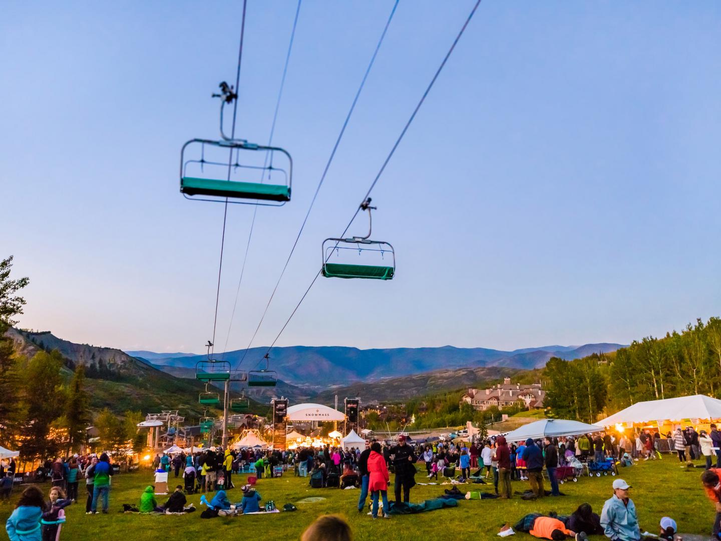 Attendees at the Snowmass Free Concert Series enjoying the Colorado mountain views 