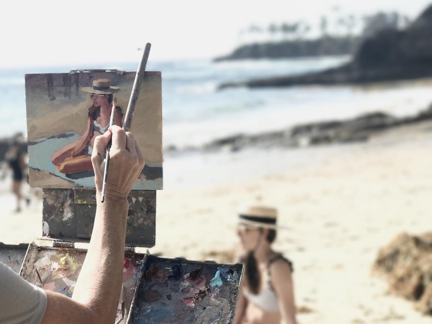 プレーン・エア・ペインティング・インビテーショナルでビーチでの一幕を描いています