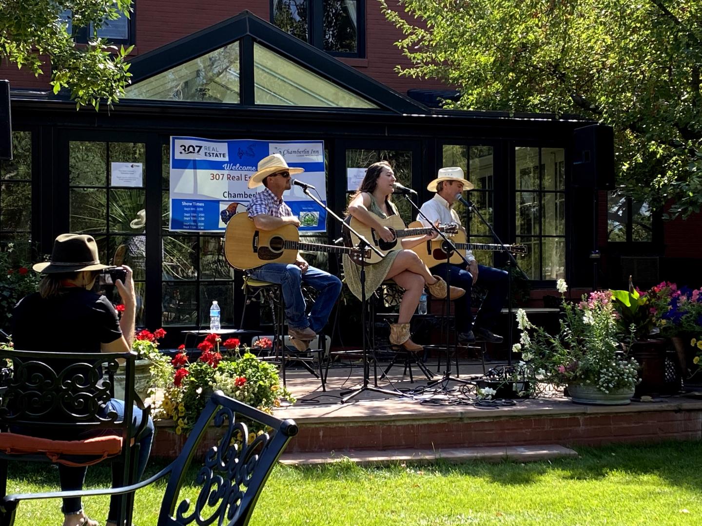 A trio of guitarists performing during the Yellowstone Songwriter Festival in Cody, Wyoming