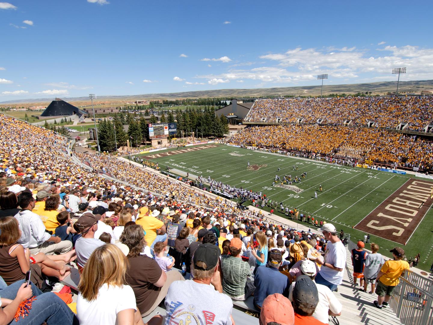 Fans enjoying a football game at the University of Wyoming in Laramie