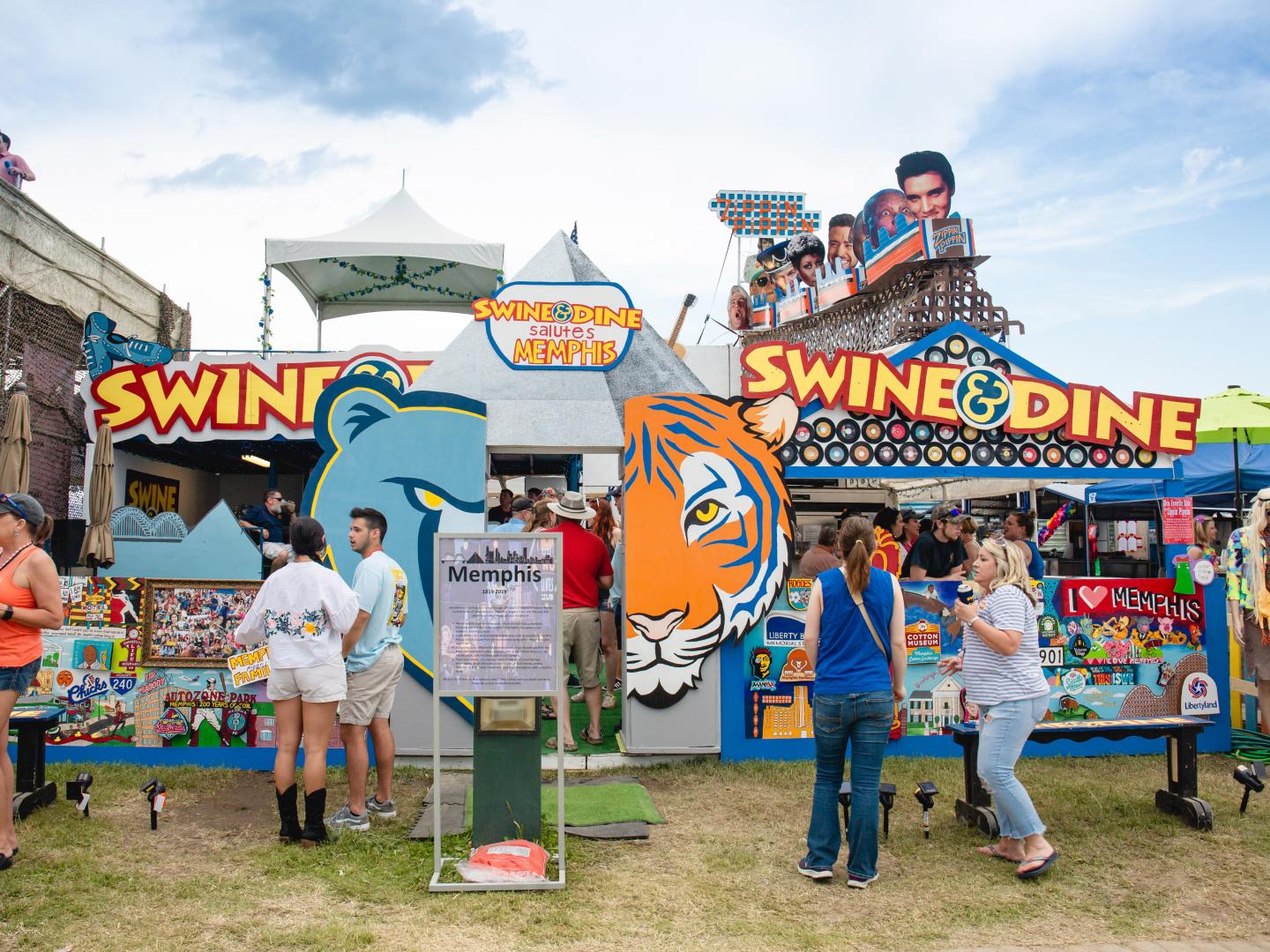 Attendees enjoying the World Championship Barbecue Cooking Contest in Memphis, Tennessee