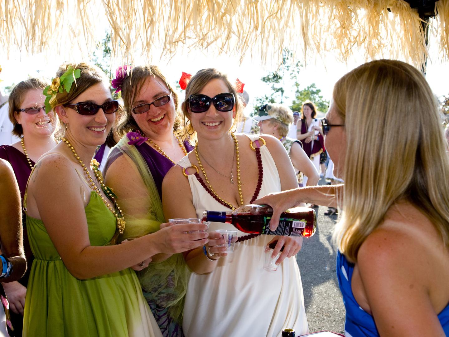 Pouring samples at Finger Lakes Wine Festival in Watkins Glen, New York