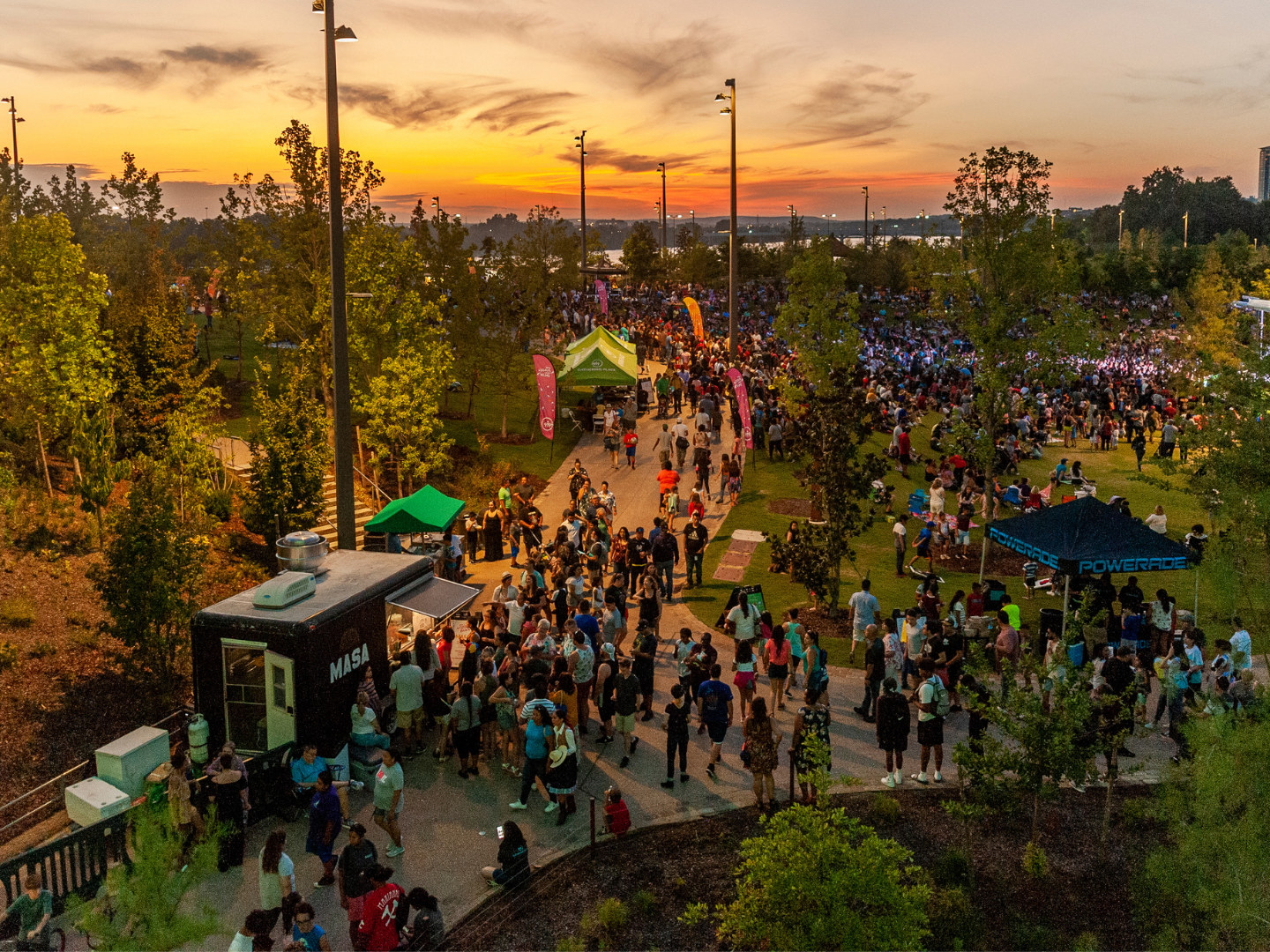 Evening festivities at the outdoor Global Gatherings World Festival at Gathering Place in Tulsa, Oklahoma