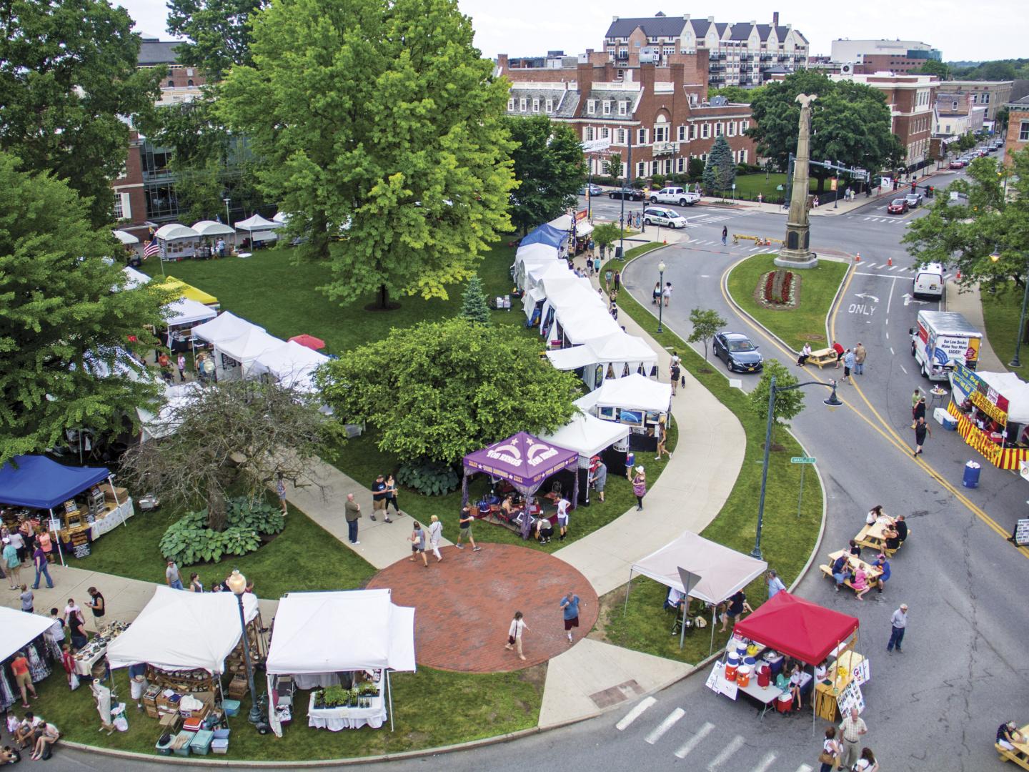 Aerial view of street vendors at LARAC June Arts Festival in Glens Falls, New York