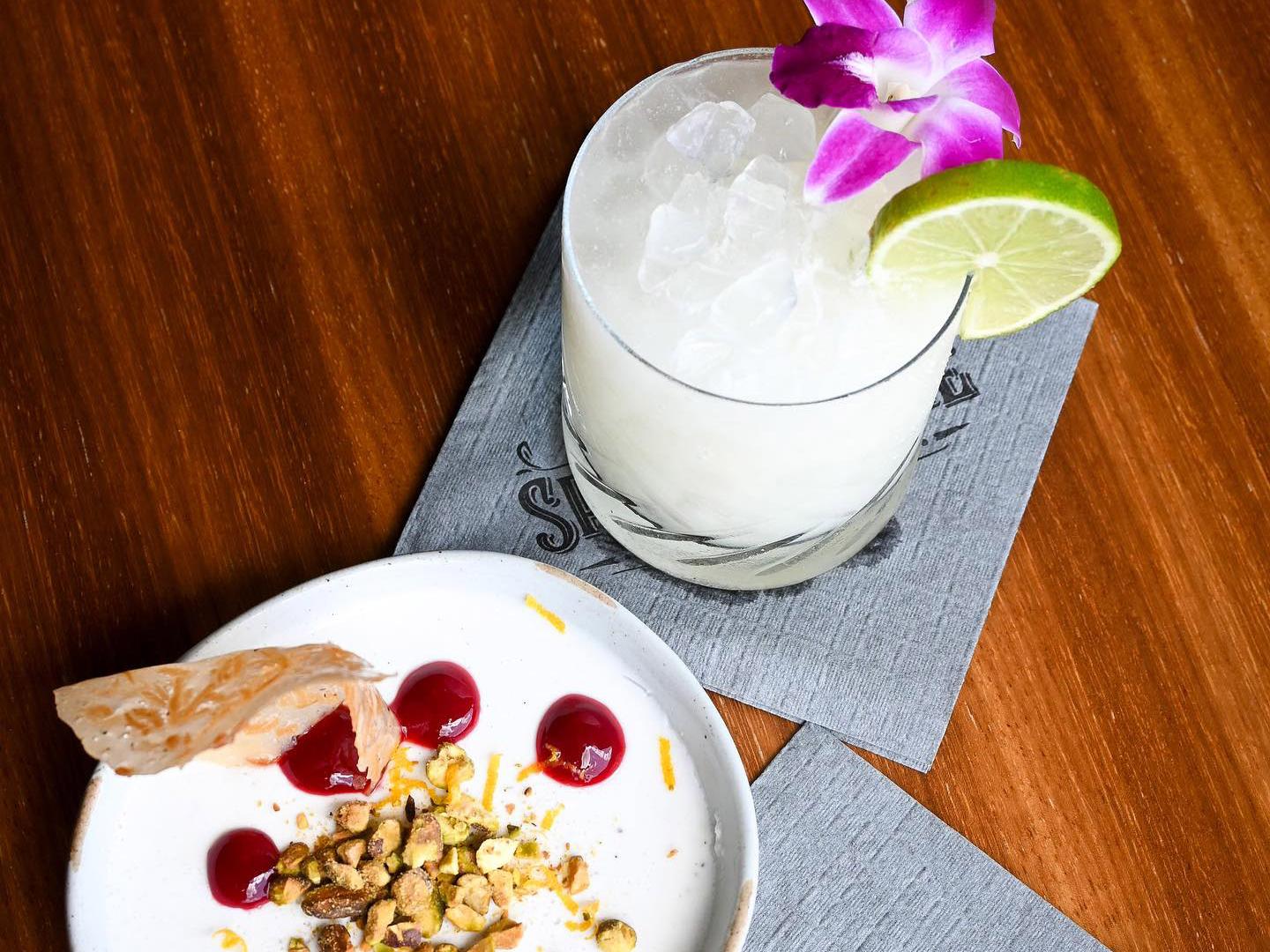 A cocktail and appetizer at Spare Birdie in Cedar Park, Texas