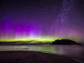 The aurora borealis, or northern lights, glowing over Little Presque Isle The aurora borealis, or northern lights, glowing over Little Presque Isle