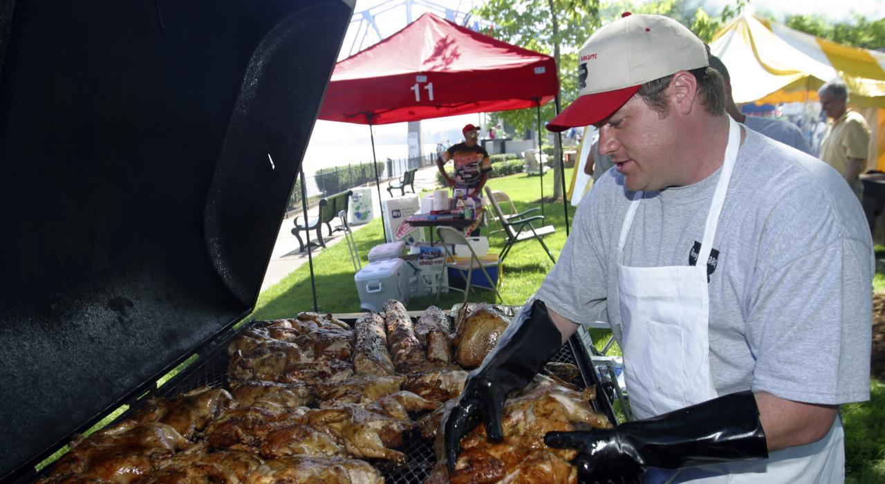 Manning the pit during the International Bar-B-Q Festival in Owensboro, Kentucky