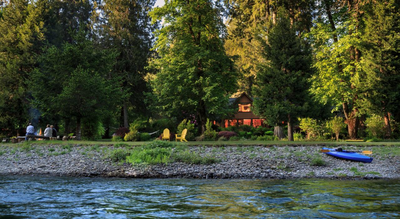 View from the McKenzie River of Eagle Rock Lodge bed and breakfast