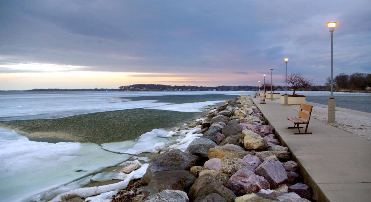 With a view of Lake Mendota, watching the setting sun at Tenney Park