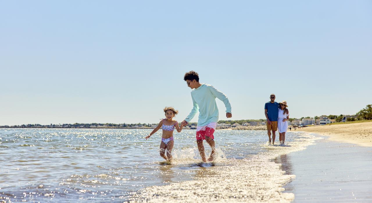 Family enjoying a beautiful day at Ferry Beach near Old Orchard Beach, Maine
