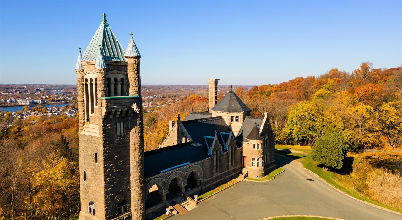 Colorful fall foliage surrounds Gardner Earl Memorial Chapel in Troy