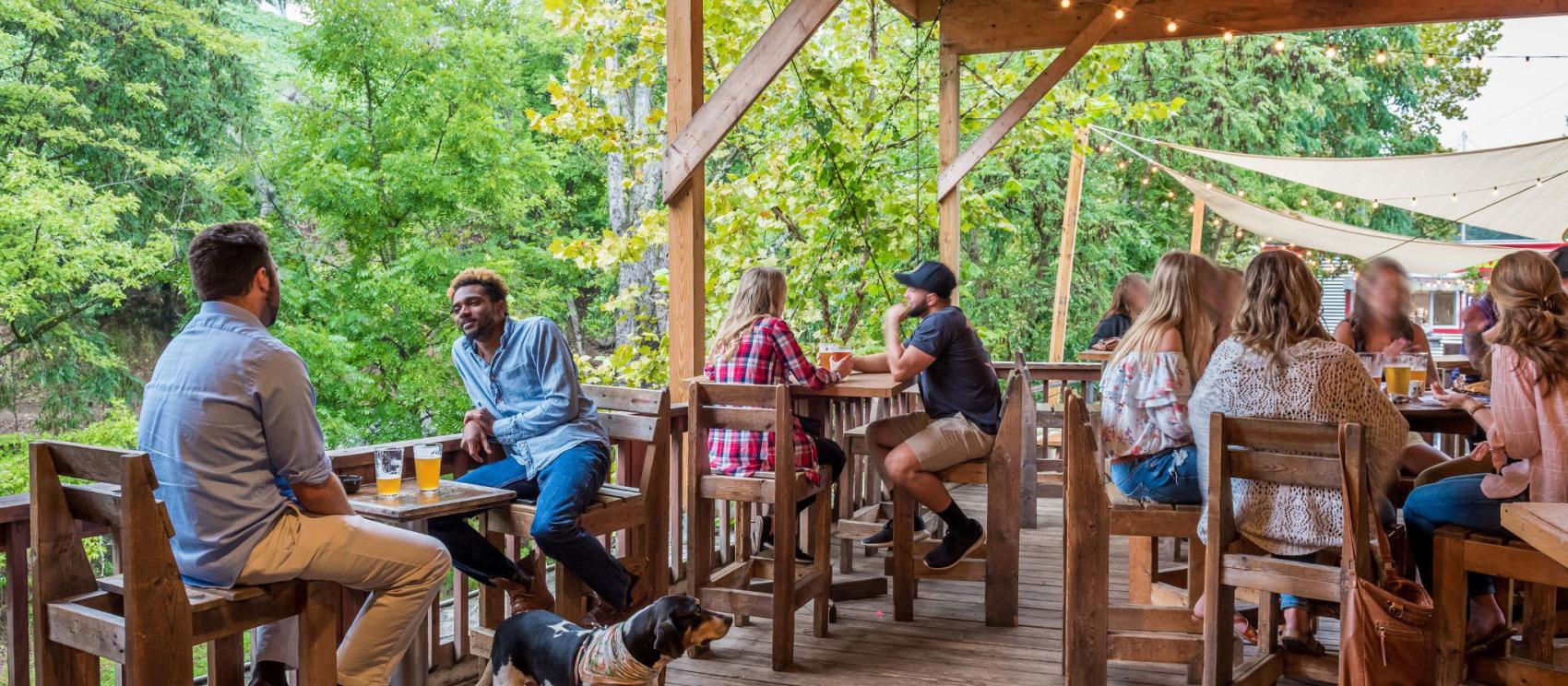 Enjoying craft beers on the patio at Innovation Brewing in Sylva